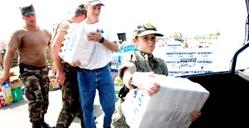 Government - Volunteers Help Distribute Supplies picture